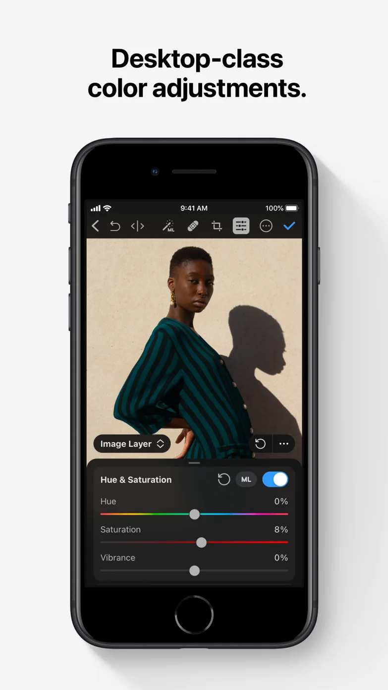 Official Photomator screenshot showing desktop-class color adjustments on iPhone